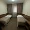 Status Hotel