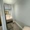 1 bed with kitchenette and bathroom 1 bed with kitchenette and bathroom