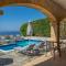 SOFIA, Luxury Stone Villa in Stoupa with Private Pool, BBQ and Amazing Sea View