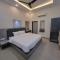 Green Villa - Peaceful Location, Luxury Rooms - 200 Meters from Bus Stand & 500 Meters from Udaipur City Railway Station