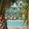 LocaLise - A05 - Plain-pied avec petite vue mer donnant sur la piscine et le jardin - Grande salle de bain - Wifi inclus - draps inclus - animaux bienvenus - parking gratuit - Le Guilvinec