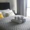 Superbly Modern and Airy Two Bedroom Seaside Apartment with Balcony