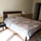 Ground floor villa with private garden, parking and shared swimming pool - Al ‘Ajūzah