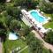 ISA - Residence with swimming pool in Sorano, apartments with air conditioning and private outdoor area