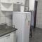 Casa com dois quartos,dois banheiros,sendo uma suíte,sala de estar cozinha e garagem - بوكوس دي كالداس