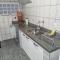 Casa com dois quartos,dois banheiros,sendo uma suíte,sala de estar cozinha e garagem - بوكوس دي كالداس