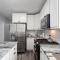 Newly rehabbed Greystone with 2 private apartments, backyard, garage, laundry, close to expressway