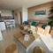 RÉF 231 - PORT-LOUIS appartement type 2 pleine vue Petite Mer avec terrasse, parking et garage dans résidence récente