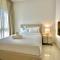 Calm Chaos 4 BR Villa with maid Room in Damac Hills 2 By Bhavan Vacation Homes - Dubaj