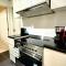 Calm Chaos 4 BR Villa with maid Room in Damac Hills 2 By Bhavan Vacation Homes - Dubaj