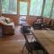 Woodshores Retreat - cozy retreat, hot tub, Lk MI - Coloma