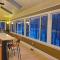 Woodshores Retreat - cozy retreat, hot tub, Lk MI