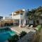 Private Luxury Scarlet beachfront villa, Molos, Paros