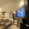 Dislocati BnB - Jacuzzi privata - Cucina - TV60" - Minimal Luxury - Marigliano