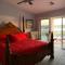 RIVERFRONT RUBY RED HOME WITH PRIVATE DOCK