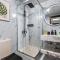 Waves Holiday Homes - Cozy & Fully Furnished Studio in Dubai Sports City