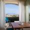 Anemone Apartment with Seaview Terrace by Wonderful Italy