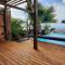 Bungalow cosy avec piscine surplombant locéan