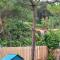 Anna Little Garden - Fish House