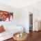 The Elements l Fire l 4 Stunning Apartments each with Private Outdoor Dining l Walk to the Beach l Family Friendly l Wifi l Netflix l Outdoor Shower l Communal BBQ Pavilion and Lawn Area l