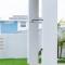 The Elements l Fire l 4 Stunning Apartments each with Private Outdoor Dining l Walk to the Beach l Family Friendly l Wifi l Netflix l Outdoor Shower l Communal BBQ Pavilion and Lawn Area l