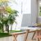 The Elements l Air l 4 Stunning Apartments each with Private Outdoor Dining l Walk to the Beach l Event Friendly l Wifi l Netflix l Outdoor Shower l Communal BBQ Pavilion and Lawn Area l