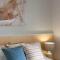 The Elements l Air l 4 Stunning Apartments each with Private Outdoor Dining l Walk to the Beach l Event Friendly l Wifi l Netflix l Outdoor Shower l Communal BBQ Pavilion and Lawn Area l
