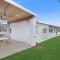 The Elements l Air l 4 Stunning Apartments each with Private Outdoor Dining l Walk to the Beach l Event Friendly l Wifi l Netflix l Outdoor Shower l Communal BBQ Pavilion and Lawn Area l