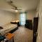Bedroom Four minutes from beach