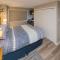 2 Bedroom and Wall Bed Mountain Getaway Ski In Ski Out Condo with Hot Pools Sleeps 8