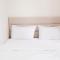 Comfy 2BR Apartment at Puncak Kertajaya Surabaya near ITS By Travelio