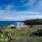 Α Peaceful Seafront Escape in Santorini- Sonus Mare