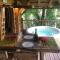 West Indies Cottage, cottages haut de gamme avec piscine, jacuzzi et vue jungle