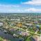 Adventure awaits with Heated Pool, Kayaks, Pool Table, & Private Beach - Villa Las Palmas - Cape Coral
