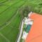 Santorini Sunset NEW 4 BR villa with beautiful rice paddy view and a large pool - Canggu