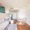 Beachside flat with free parking