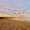 Beachside flat with free parking