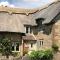 Chocolate box thatched cottage - Calbourne