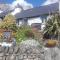 Traditional stone cottage with sea views in Snowdonia National Park - Brynkir