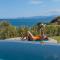 Beachfront Linum Escape Retreat with a Heated Pool - Айос-Ніколаос