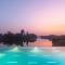 StayVista's Waterway Retreat - Lakeside Oasis with Infinity Pool - Wada