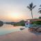 StayVista's Waterway Retreat - Lakeside Oasis with Infinity Pool - Wada