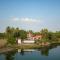 StayVistas Waterway Retreat - Lakeside Oasis with Infinity Pool