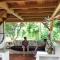 Timberframe house in an orchard by Corcovado park - Agujas