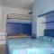 Enjoy the beach breeze in our colorful flat - Bibione