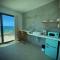 1 Corcega Beachfront Suites