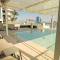 Beachfront Bliss - Apartment with Pool and Premium Amenities - Dubaj