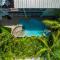 Tropical Hideaway - برادنتون بيتش