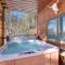 Lead Cabin Rental with Private Hot Tub and Game Room!