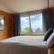 Seaview, Sun and Surf - Piha Holiday Home
